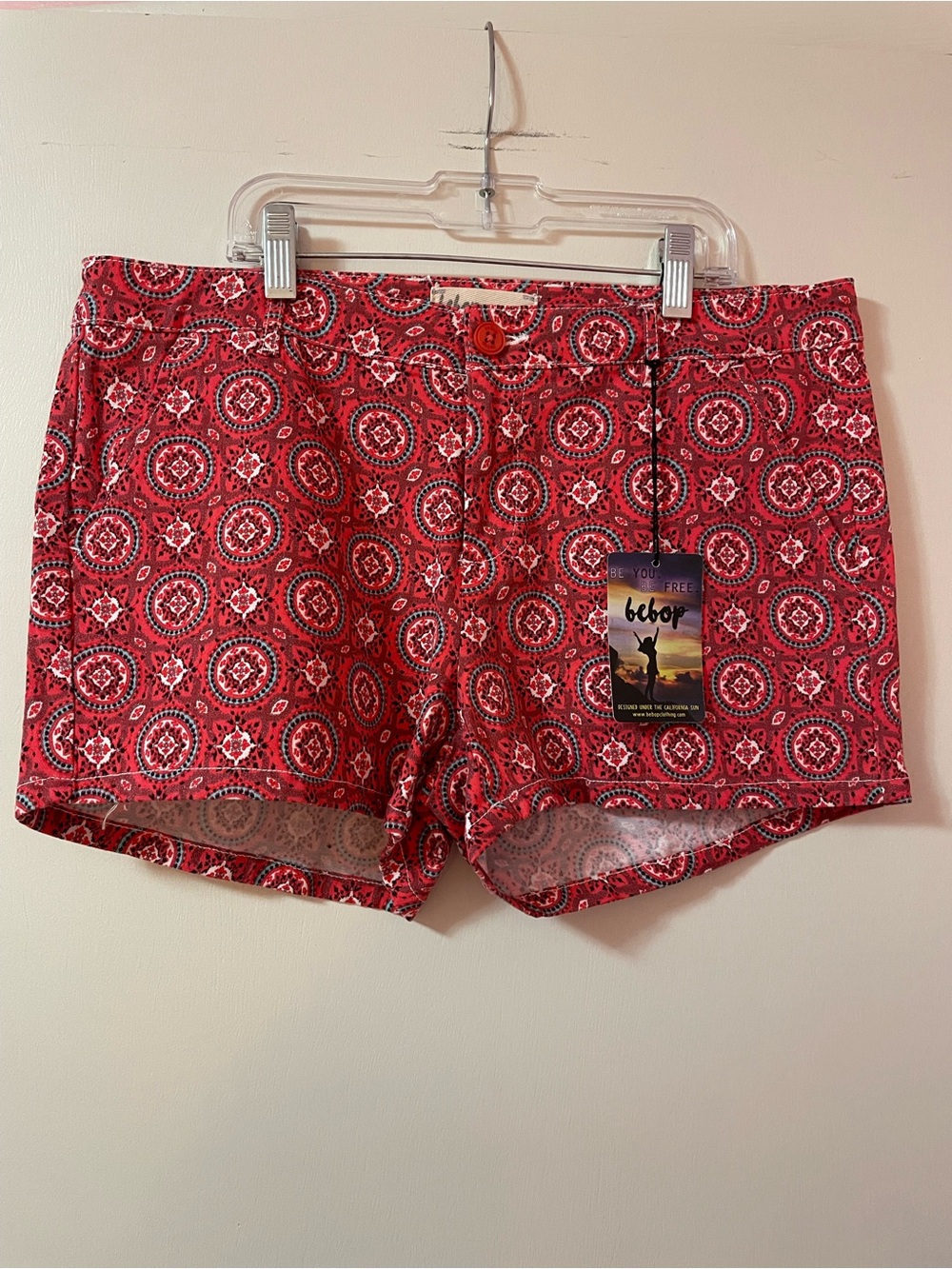 NWT Bebop red shorts with white and blue circular geometric pattern